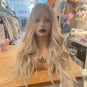 - Human hair ombre blonde wavy wig with bang